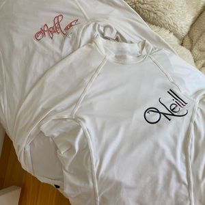 Two O’Neill rash-guards, sun-guards ~ white. Small